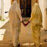 Tunisia - two women holding hands